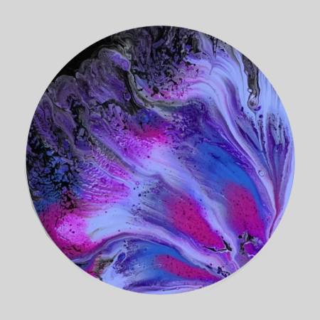 A purple and blue painting is shown on the surface.