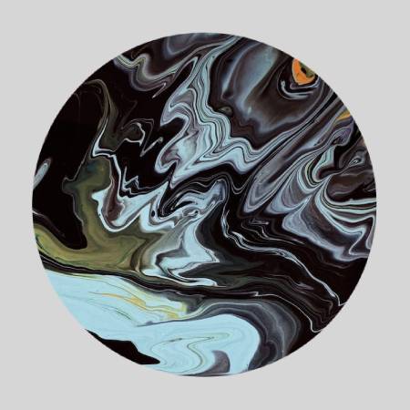 A painting of black and white swirls on the ground.