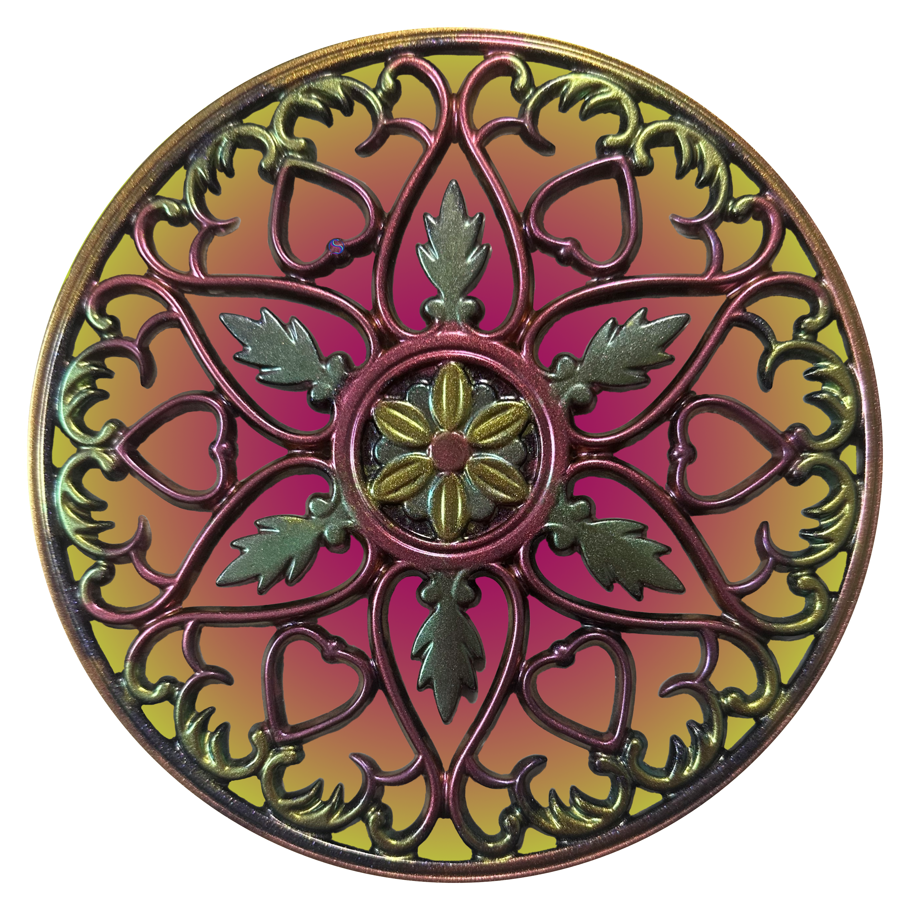 A circular ornament with green and red designs.